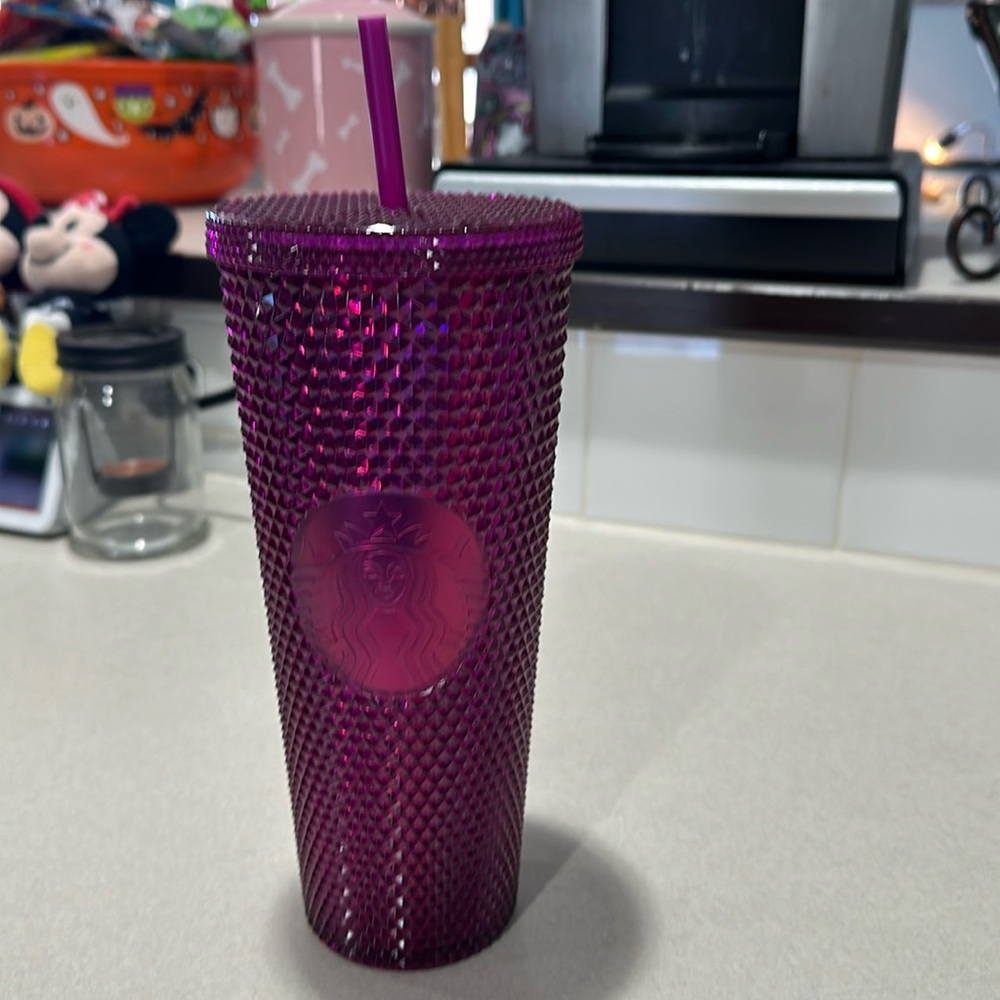 Bright pink Starbucks tumbler